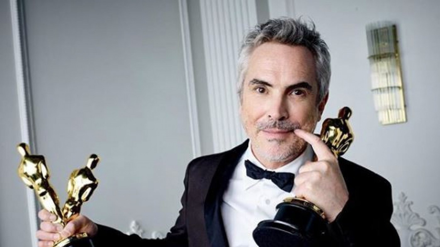 Alfonso Cuarón con sus tres estatuillas
