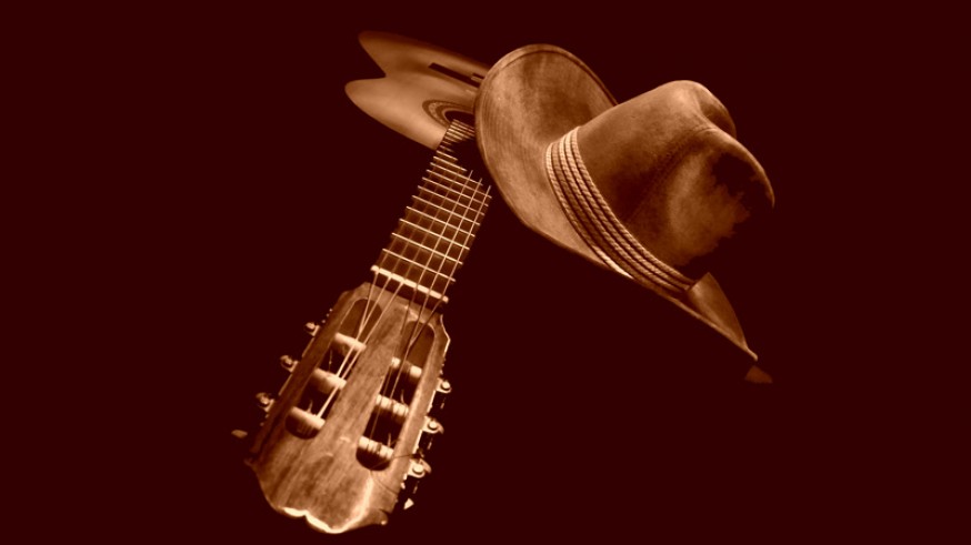 Guitarra y sombrero vaquero
