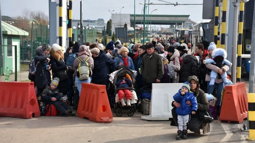 Refugiados ucranianos entrando en Polonia